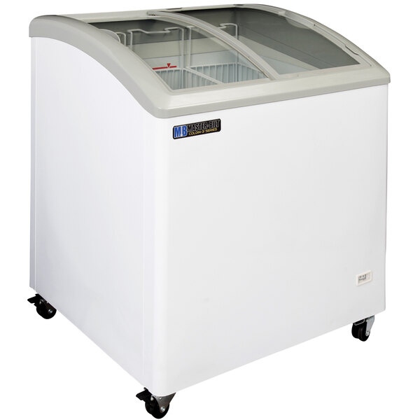 A white Master-Bilt curved top display freezer with a glass top.