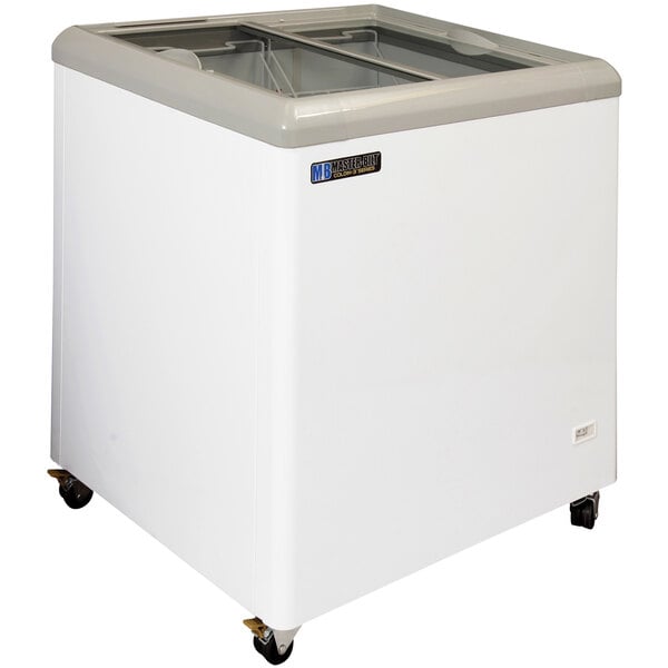 A white Master-Bilt display freezer with a grey top on wheels.