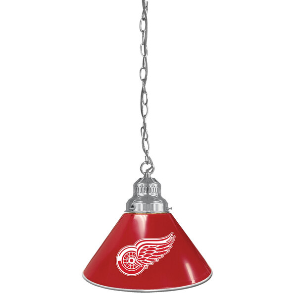 A red lamp with a white Detroit Red Wings logo shade.