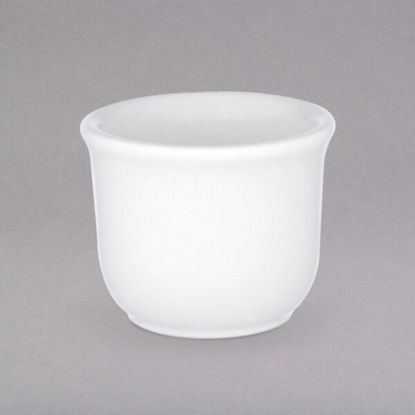 A Villeroy & Boch white porcelain egg cup with lid.