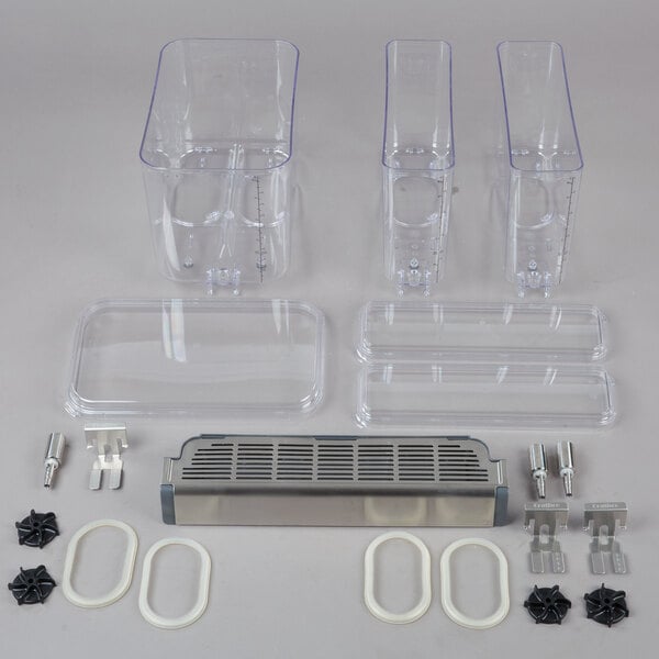 A white oval Crathco beverage dispenser bowl assembly with clear plastic containers.
