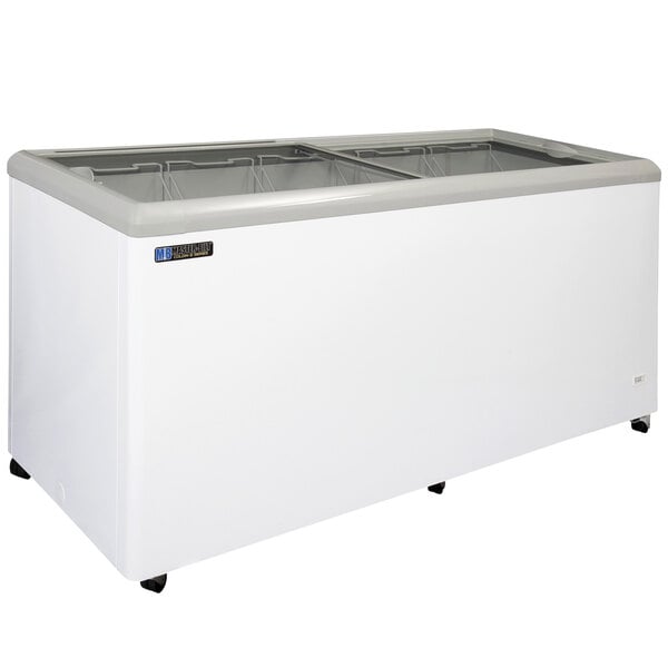 A white Master-Bilt flat top display freezer with a grey lid.
