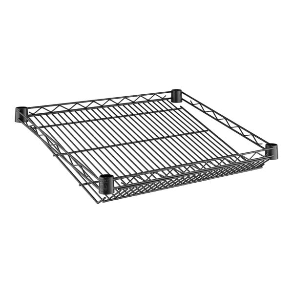 A black wire shelf with a slanted metal grid.
