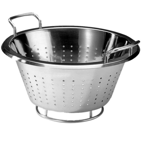 A close-up of a stainless steel Matfer Bourgeat conical colander with holes and handles.