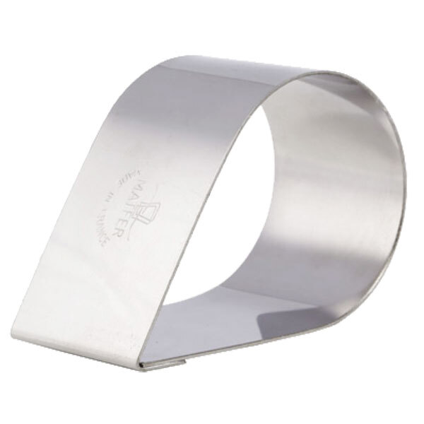 A stainless steel Matfer Bourgeat ring mold with a curved edge and logo.