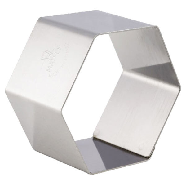 A stainless steel hexagon shaped ring mold.
