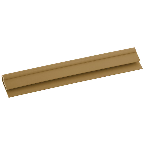 A tan rectangular plastic strip with a long handle.