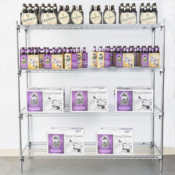 A Metro chrome wire shelving unit with boxes and bottles on the shelves.