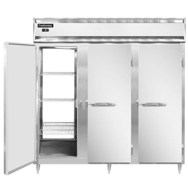 A white Continental pass-through freezer with two open stainless steel doors.