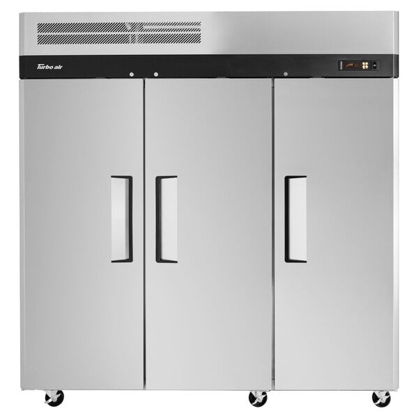A large silver Turbo Air reach-in refrigerator with black handles.