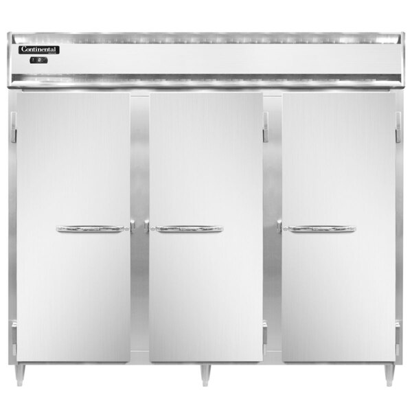 A white Continental reach-in freezer with three solid doors.