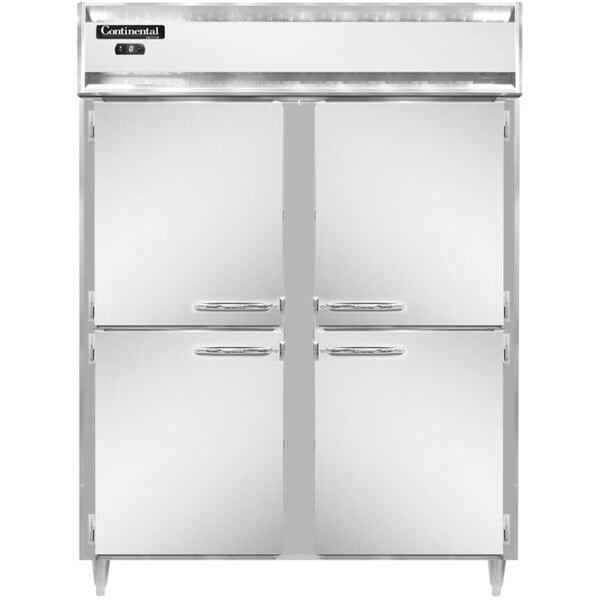 A white Continental reach-in freezer with stainless steel half doors with silver handles.