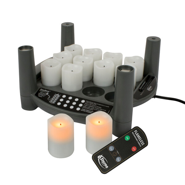 A Sterno 2.0 amber flameless votive set with remote control and charging base.