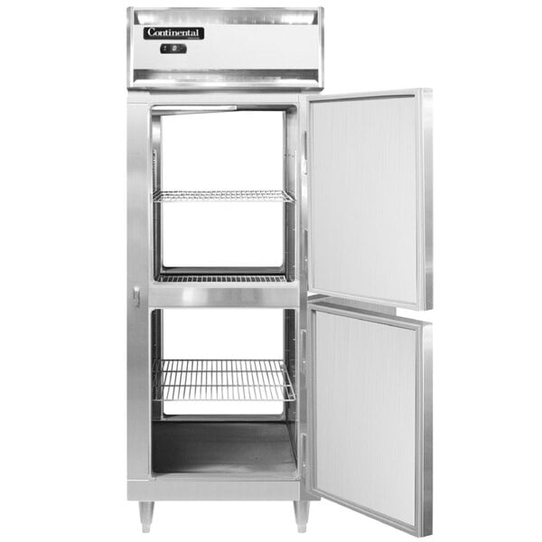 A Continental stainless steel reach-in freezer with two half doors open.
