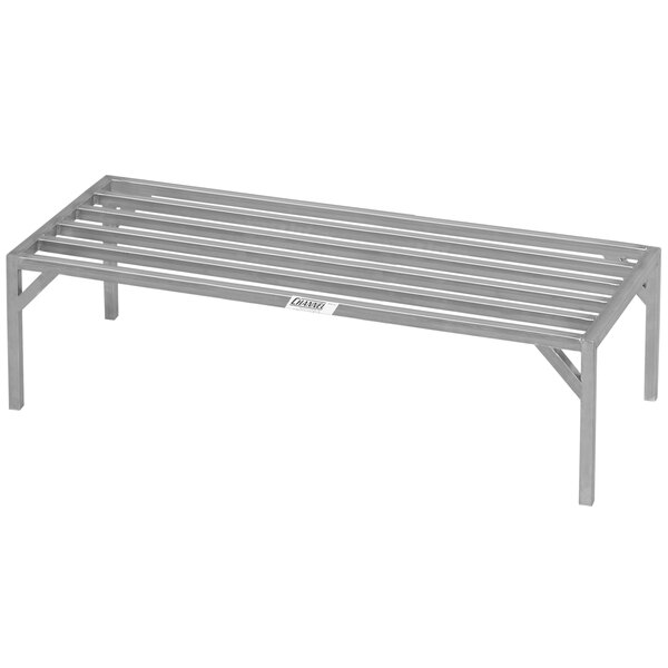 A Channel heavy-duty stainless steel dunnage rack with two legs and a shelf.