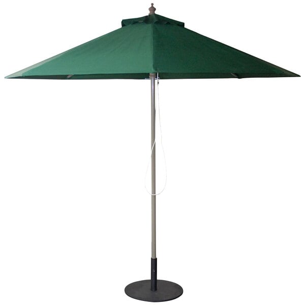 An American Tables & Seating green umbrella on a metal pole.