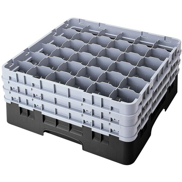 A black plastic Cambro glass rack with compartments and an extender.