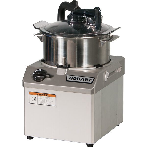 A Hobart commercial food processor with a stainless steel bowl and lid.