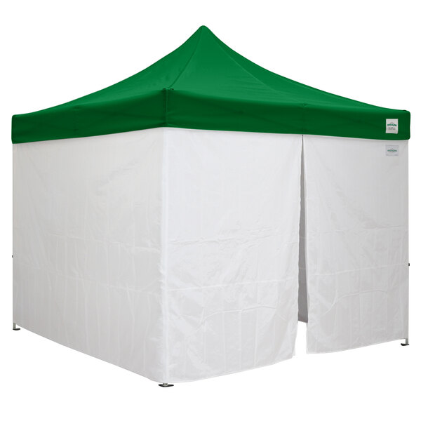 A green tent with a white top and side walls.