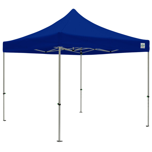 A blue Caravan Canopy tent with poles and white text on the sides.