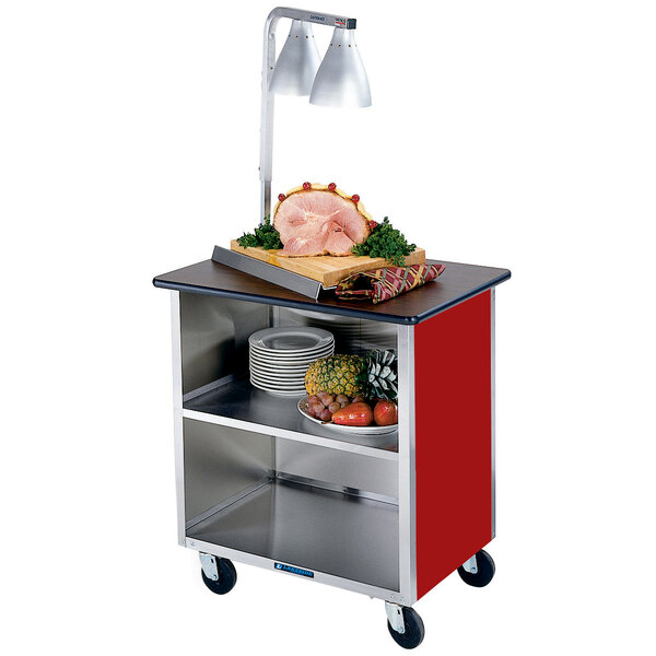 A red Lakeside utility cart with food on it.