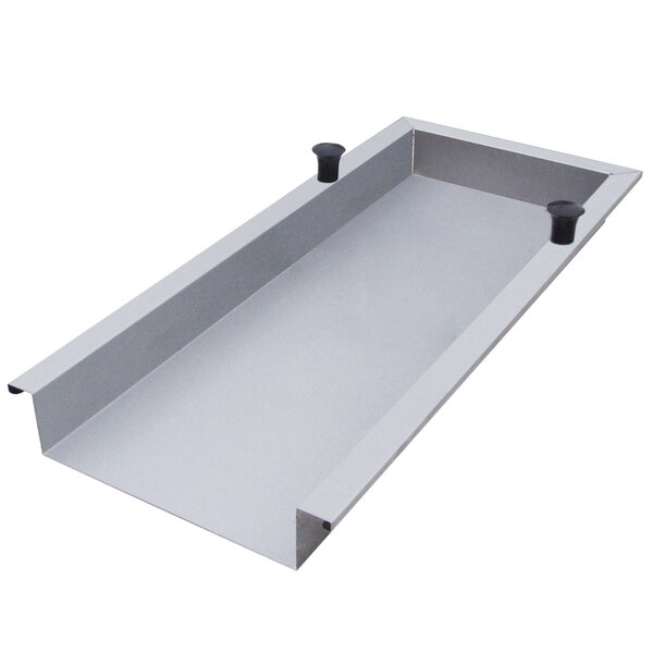 A rectangular metal tray with a black knob.