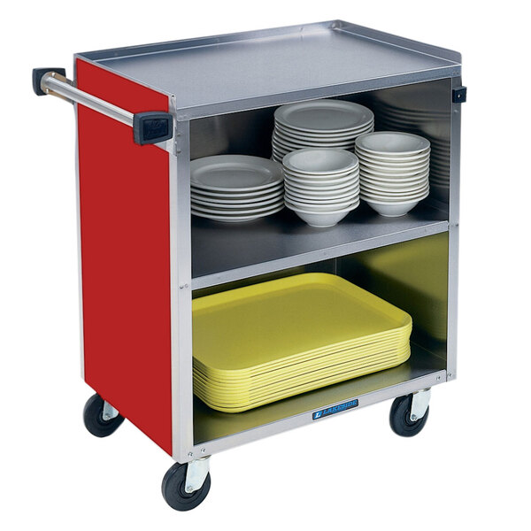 A red Lakeside stainless steel utility cart with plates and bowls on it.