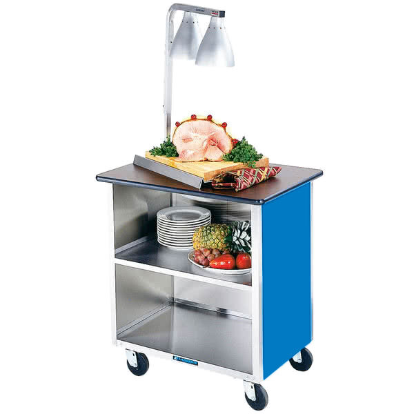 A Lakeside stainless steel utility cart with food on top.