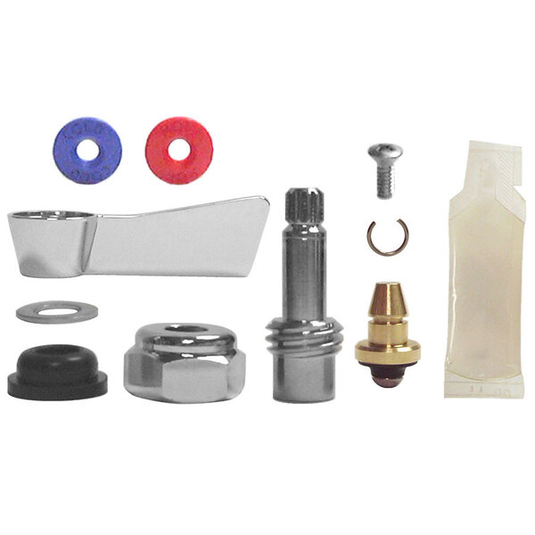 A Fisher brass swivel stem repair kit with a white rectangular object and a nut.