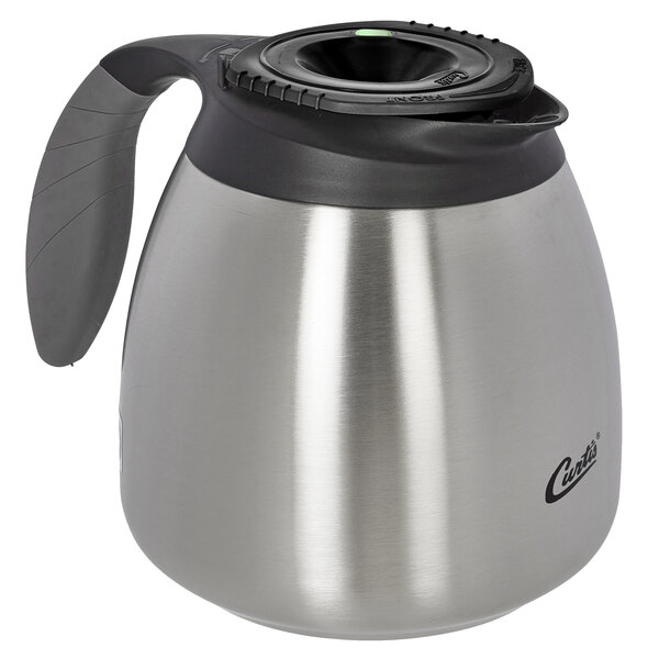 A stainless steel Curtis Freshtrac coffee carafe with a black handle.