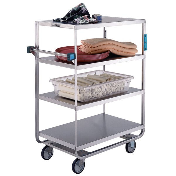 A Lakeside stainless steel utility cart with four shelves.