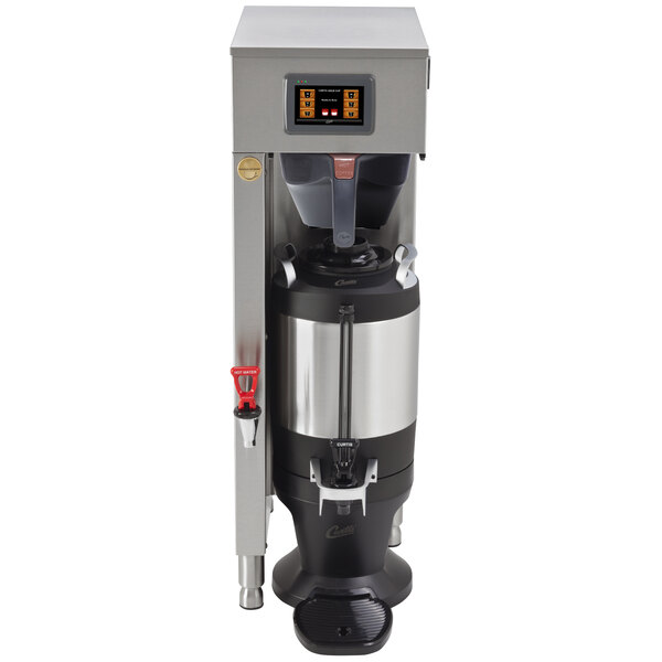 A Curtis G4 ThermoPro coffee maker with a black and silver base.