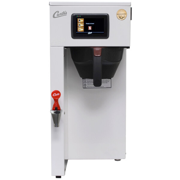 A white Curtis G4 ThermoPro coffee machine with black and white buttons and screen.