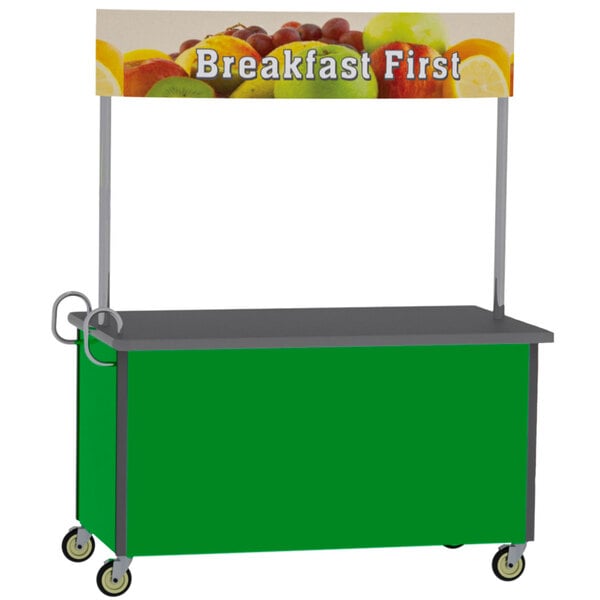 A Lakeside stainless steel vending cart with green and grey surfaces and a sign reading "Breakfast" filled with fruit and breakfast foods.