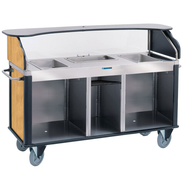 A stainless steel Lakeside food cart with a light maple counter top.