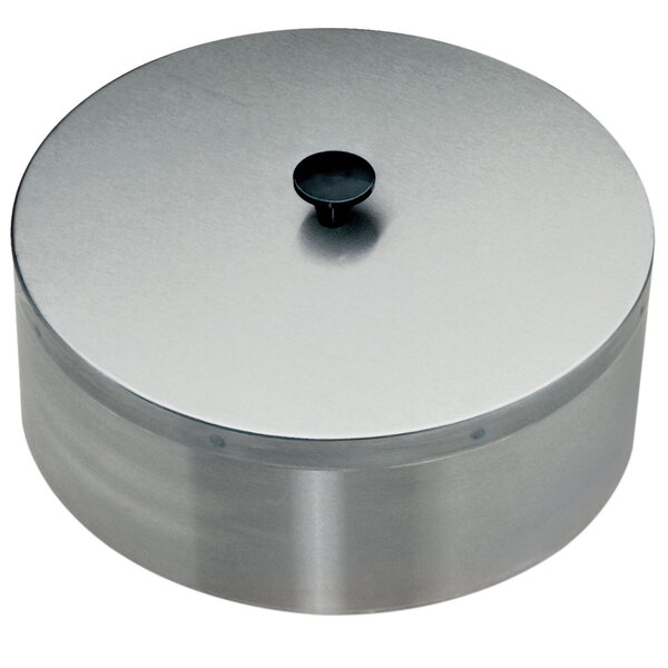 A round silver container with a black lid.