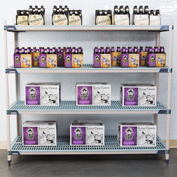A MetroMax shelving unit with boxes and bottles of beer on the shelves.