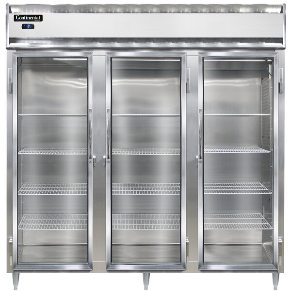A stainless steel Continental glass door reach-in freezer with three glass doors.