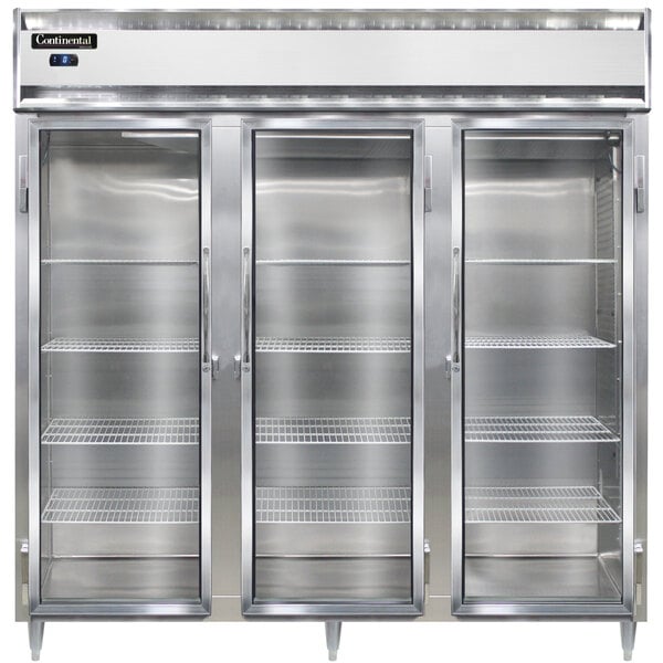 A stainless steel Continental reach-in freezer with three glass doors.