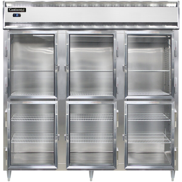 A stainless steel Continental reach-in freezer with glass doors and shelves.