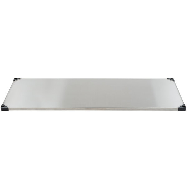 A rectangular stainless steel shelf with black corners.