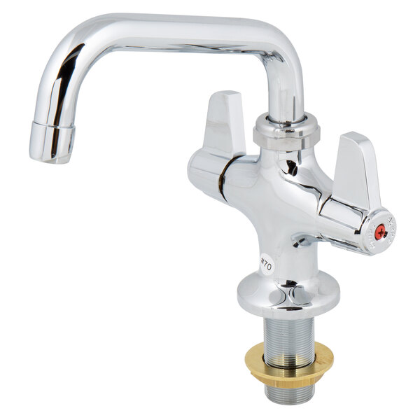 A silver Equip by T&S deck-mounted faucet with a gold spout and brass lever handles.