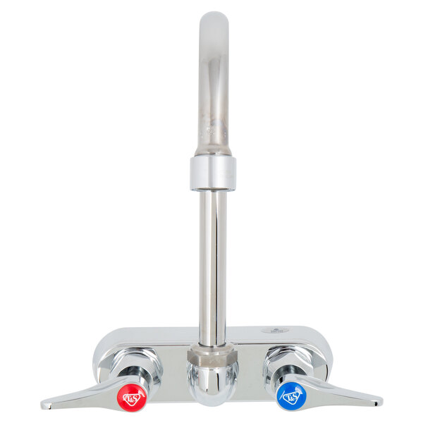 A T&S chrome wall mount faucet with lever handles and blue and red accents.