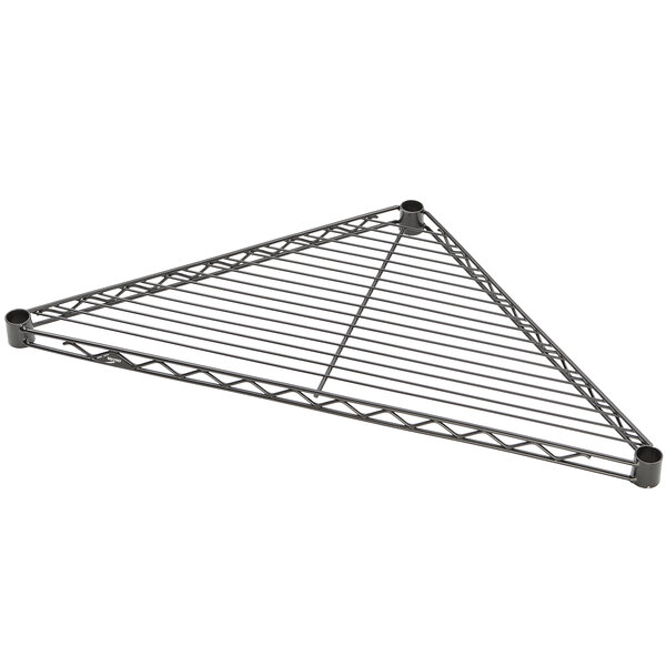 A black metal triangle shelf with a wire grid.