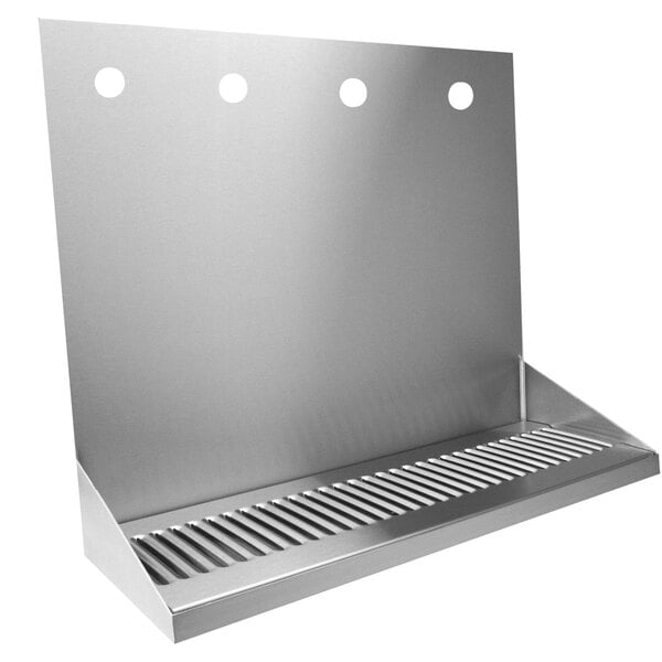 A Micro Matic stainless steel wall mount drip tray with four faucets.