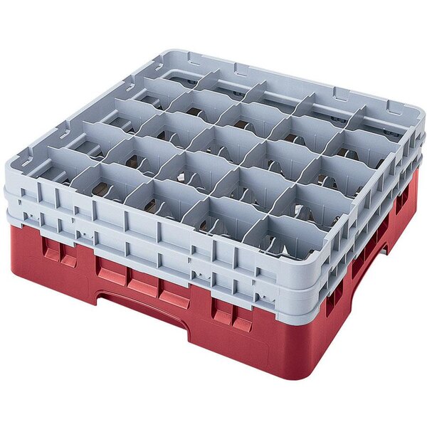 A red plastic Cambro glass rack with compartments and extenders.