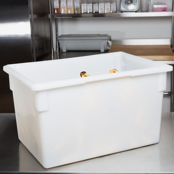 A white plastic Cambro food storage container on a white counter.