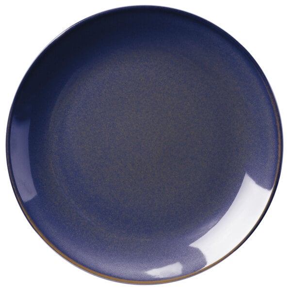 A close-up of a blue plate with a white border.