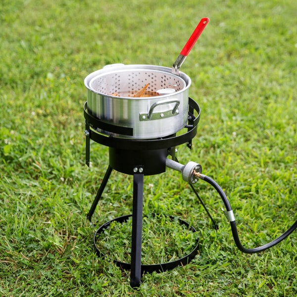 A Backyard Pro fish fryer pot on a propane gas burner.