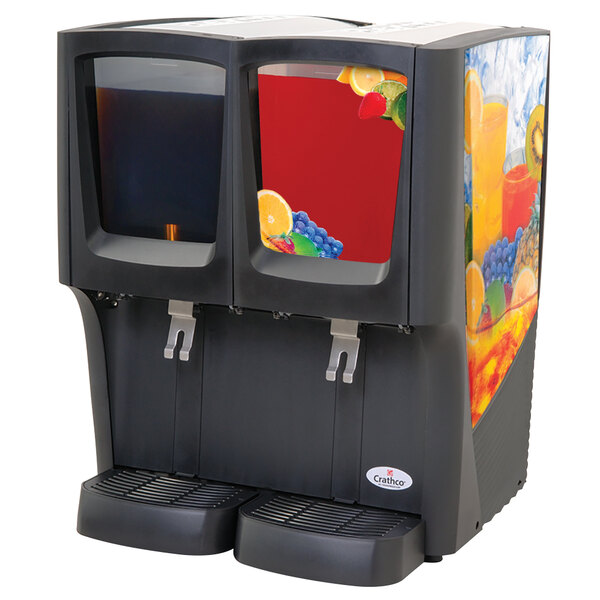 A Crathco refrigerated beverage dispenser with two dispensers, each with a fruit decal.